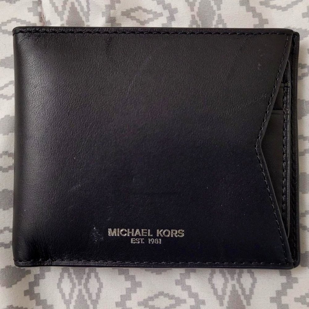 Michael Kors black leather wallet with card holder and pocket.  NWOT